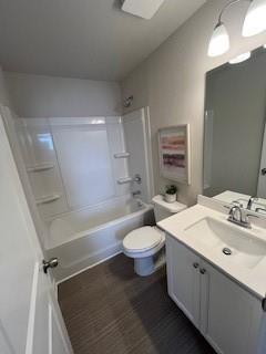 4258 SW Notting Hill Dr Unit 32, Atlanta, GA 30331 - bathroom featuring bathing tub / shower combination, wood finished floors, vanity, and toilet