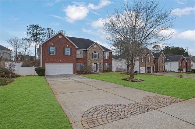 view of front of home featuring a front lawn and a garage