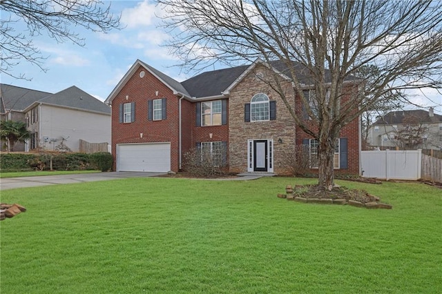 view of front of house featuring a garage and a front yard