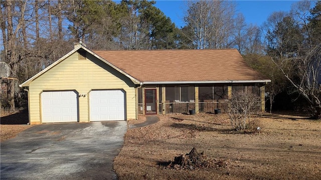 view of front of property with a garage