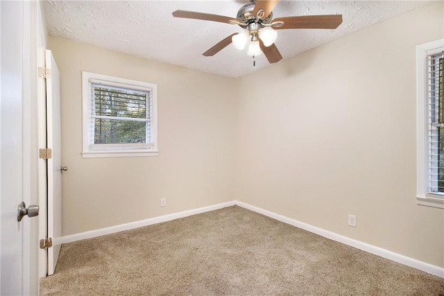 3449 Misty Valley Rd, Decatur, GA 30032 - carpeted empty room with a textured ceiling, ceiling fan, and baseboards