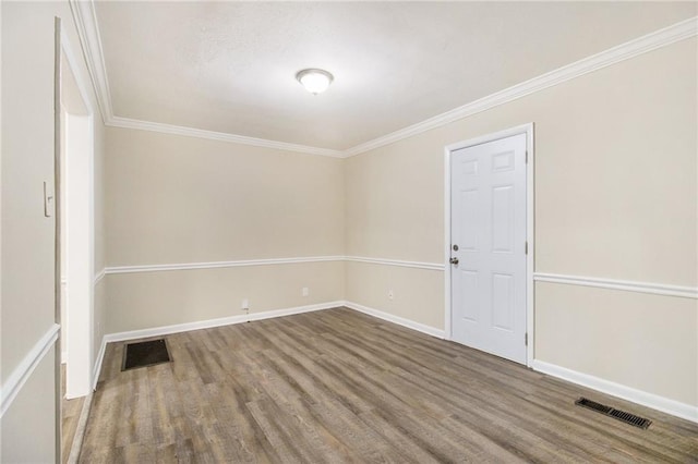 3449 Misty Valley Rd, Decatur, GA 30032 - unfurnished room featuring crown molding, baseboards, and wood finished floors
