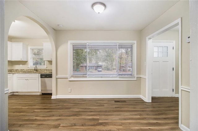 3449 Misty Valley Rd, Decatur, GA 30032 - entrance foyer featuring dark wood-type flooring, plenty of natural light, baseboards, and arched walkways
