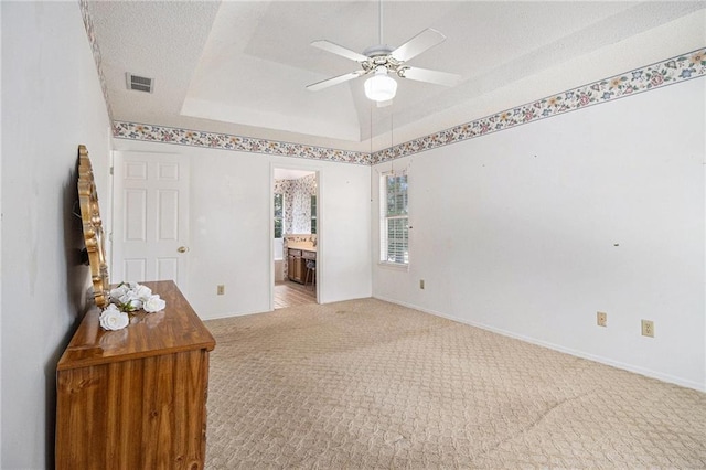 1900 Green Oak Cir, Lawrenceville, GA 30043 - unfurnished bedroom featuring light colored carpet, connected bathroom, and a ceiling fan