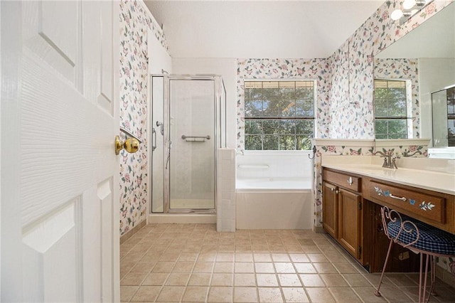 1900 Green Oak Cir, Lawrenceville, GA 30043 - full bathroom with wallpapered walls, vanity, a garden tub, a shower stall, and lofted ceiling
