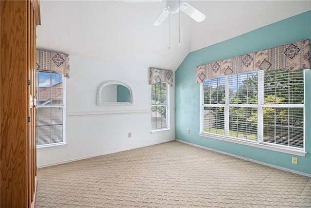 1900 Green Oak Cir, Lawrenceville, GA 30043 - carpeted spare room with lofted ceiling and ceiling fan