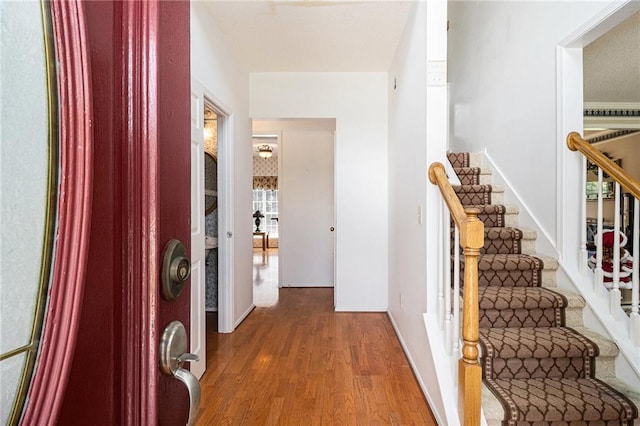 1900 Green Oak Cir, Lawrenceville, GA 30043 - foyer featuring wood finished floors and stairway
