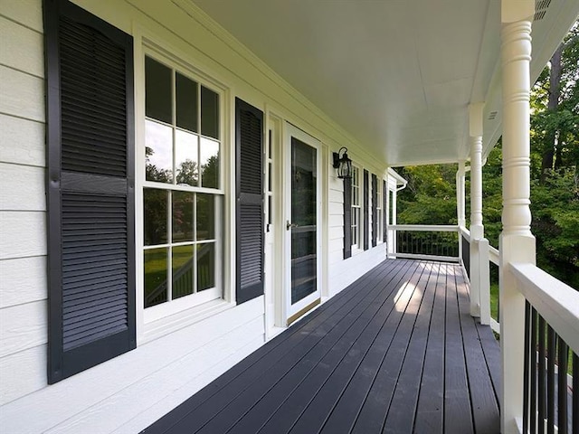 wooden terrace featuring a porch