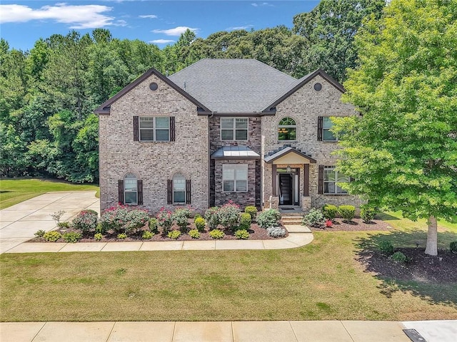 271 Learwood Ln, Atlanta, GA 30349 - view of front facade with a front lawn and brick siding