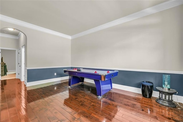 271 Learwood Ln, Atlanta, GA 30349 - recreation room with arched walkways, crown molding, wood-type flooring, and baseboards