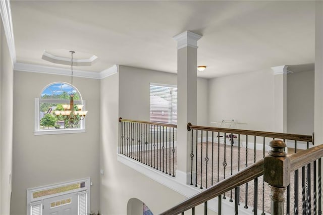 271 Learwood Ln, Atlanta, GA 30349 - hallway featuring a chandelier and ornamental molding
