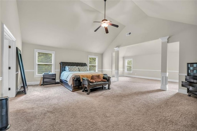 271 Learwood Ln, Atlanta, GA 30349 - carpeted bedroom with ornate columns, high vaulted ceiling, baseboards, and ceiling fan