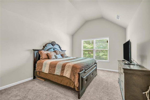 271 Learwood Ln, Atlanta, GA 30349 - bedroom featuring lofted ceiling, light colored carpet, and baseboards