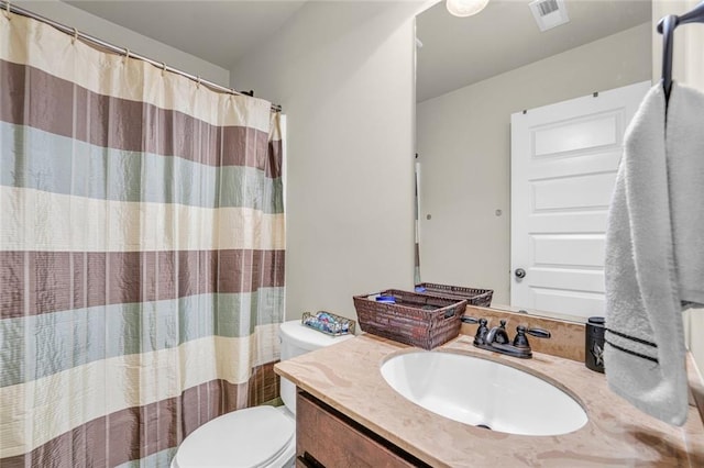 271 Learwood Ln, Atlanta, GA 30349 - bathroom with toilet, vanity, and a shower with curtain