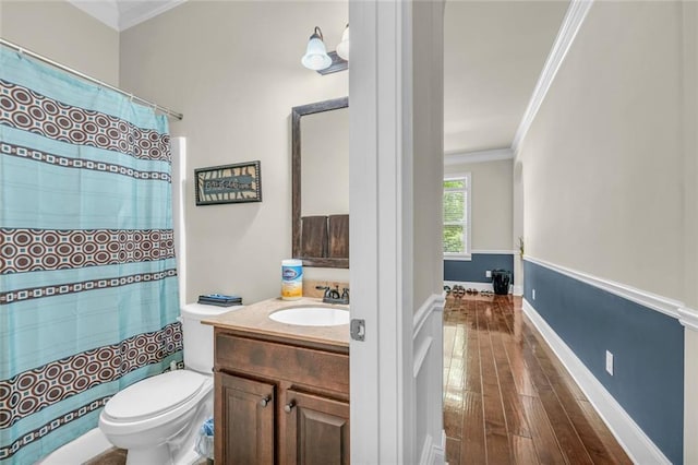 271 Learwood Ln, Atlanta, GA 30349 - bathroom featuring crown molding, vanity, toilet, hardwood / wood-style floors, and a shower with curtain