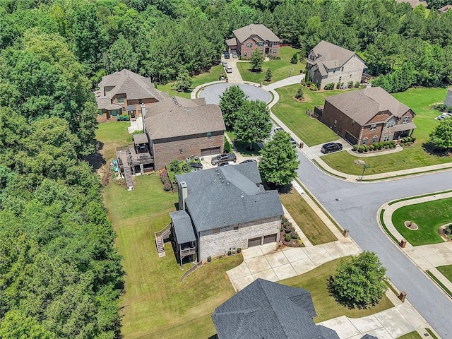 271 Learwood Ln, Atlanta, GA 30349 - aerial perspective of suburban area with a heavily wooded area