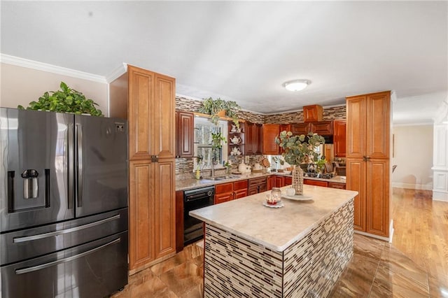 4983 Arcado Rd SW, Lilburn, GA 30047 - kitchen with ornamental molding, light countertops, stainless steel fridge, and dishwasher