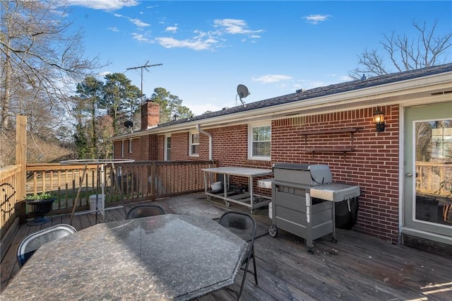 4983 Arcado Rd SW, Lilburn, GA 30047 - wooden deck featuring outdoor dining space