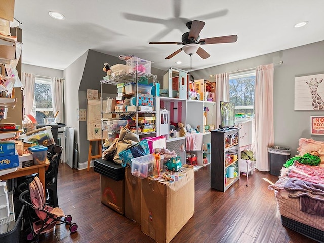 home office with a ceiling fan, a wealth of natural light, recessed lighting, and wood finished floors