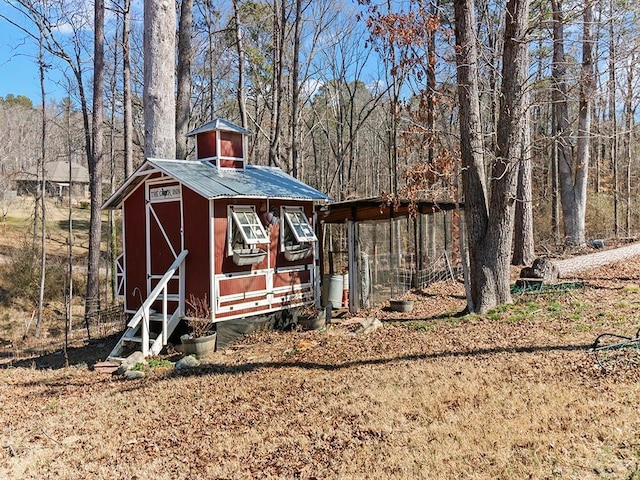 view of outdoor structure featuring an outdoor structure