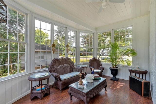 sunroom / solarium featuring ceiling fan and wood ceiling