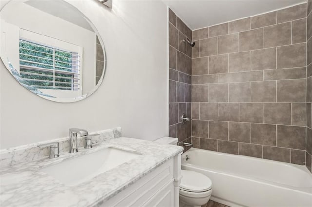 full bathroom featuring vanity, toilet, and shower / bathtub combination