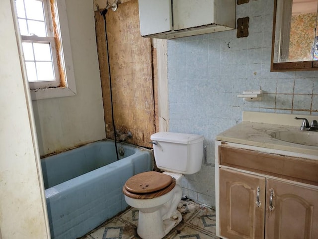 full bathroom featuring vanity and toilet