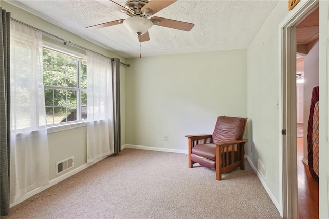2026 Mcdaniel Mill Rd SW, Conyers, GA 30094 - unfurnished room featuring a textured ceiling, carpet, baseboards, and ceiling fan