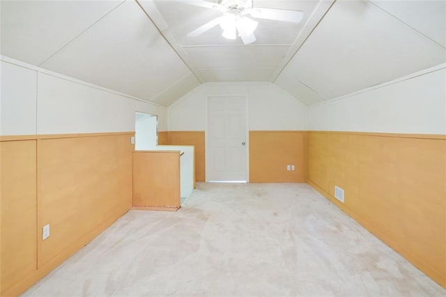 2026 Mcdaniel Mill Rd SW, Conyers, GA 30094 - bonus room with vaulted ceiling, carpet, and ceiling fan