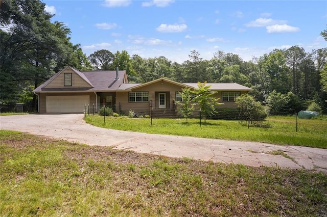 2026 Mcdaniel Mill Rd SW, Conyers, GA 30094 - ranch-style home featuring concrete driveway, an attached garage, and a front lawn
