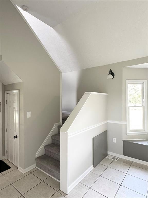 238 Marks Rd, Mansfield, GA 30055 - stairs with vaulted ceiling and tile patterned flooring