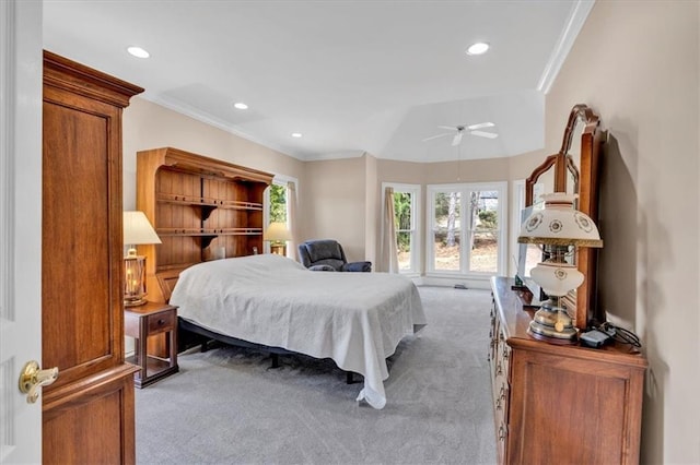 carpeted bedroom featuring recessed lighting, a ceiling fan, and crown molding