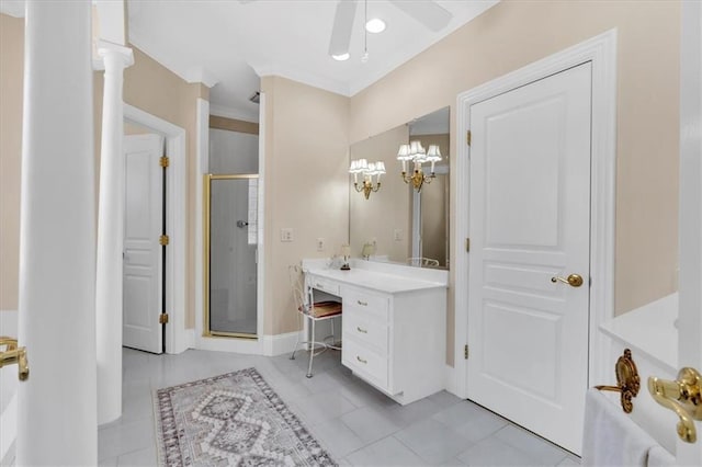 full bath featuring a stall shower, vanity, and ceiling fan