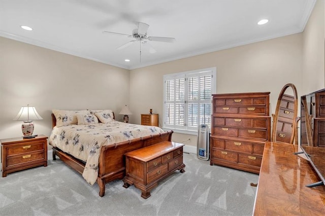 bedroom featuring recessed lighting, crown molding, ceiling fan, and carpet floors