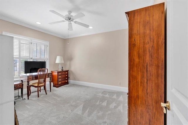 office with a ceiling fan, baseboards, recessed lighting, crown molding, and light colored carpet