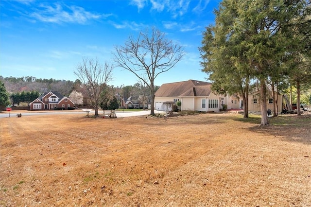 view of yard with a garage