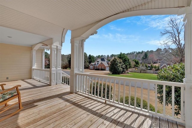 wooden deck featuring covered porch