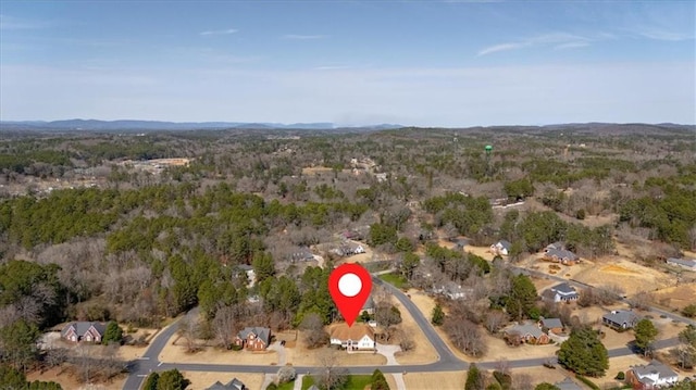 bird's eye view featuring a view of trees