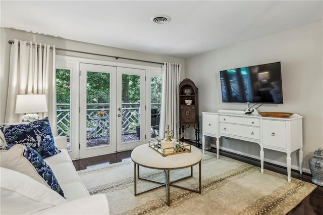 3650 Ashford Dunwoody Rd NE Unit 1024, Atlanta, GA 30319 - living room with wood finished floors and french doors