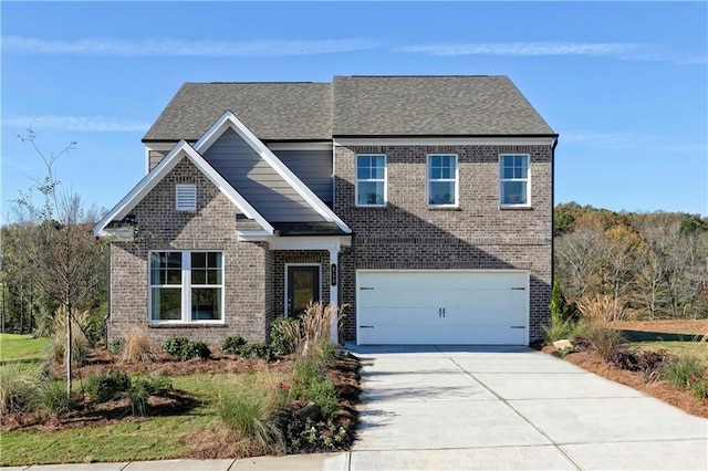 traditional-style house with brick siding, driveway, an attached garage, and a shingled roof