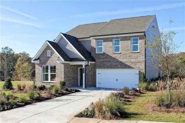 traditional-style house featuring brick siding, driveway, an attached garage, and a shingled roof