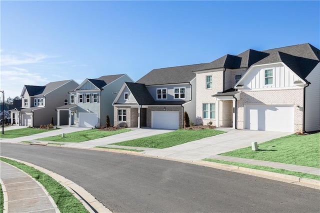 view of front facade with an attached garage, a residential view, and concrete driveway