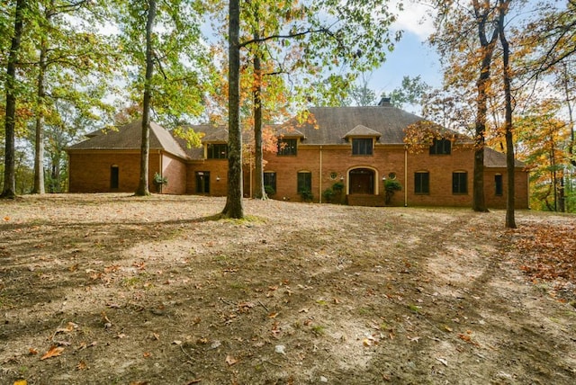 view of front of home with a chimney