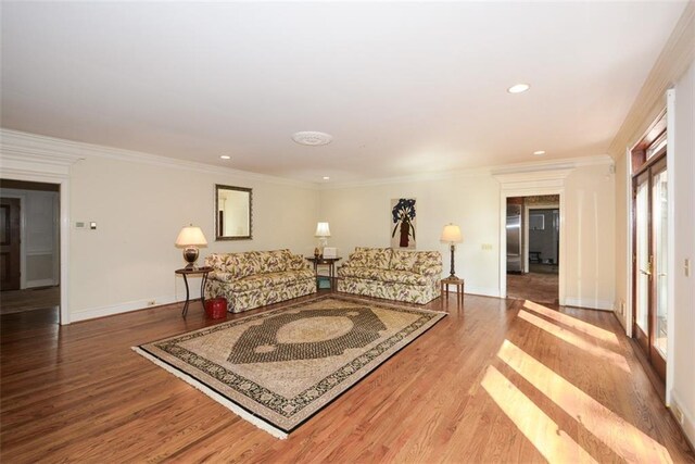 bathroom featuring tile patterned floors, vanity, a tub to relax in, and crown molding