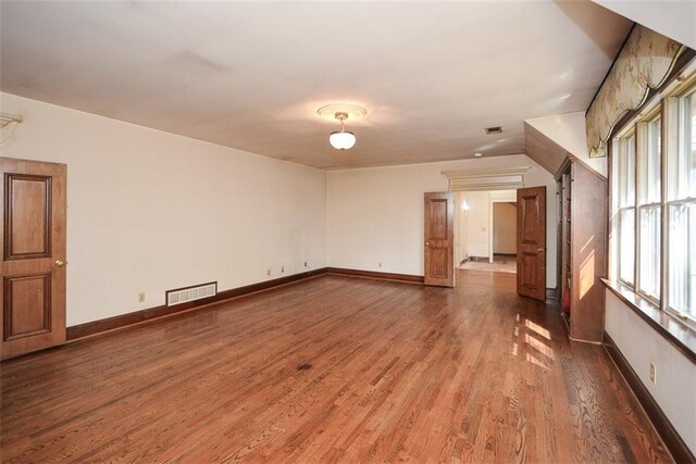 additional living space featuring carpet flooring, ceiling fan, and lofted ceiling