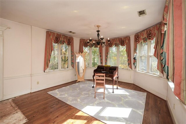 carpeted living room with ceiling fan and lofted ceiling