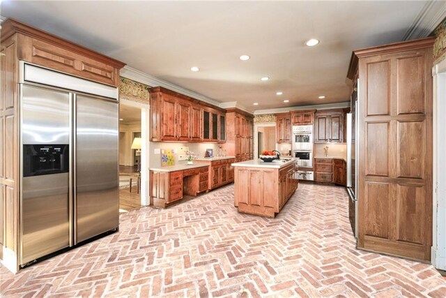 hall with crown molding and a high ceiling