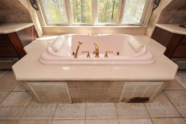 bathroom featuring vanity and a shower with shower door