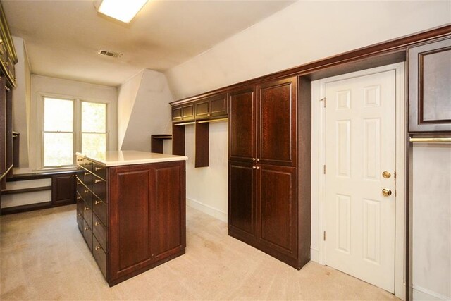 bedroom featuring light hardwood / wood-style flooring, ceiling fan, and ornamental molding