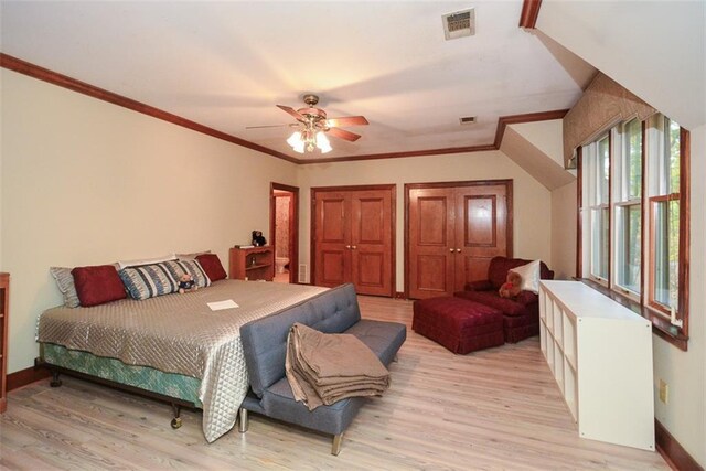 interior space featuring ceiling fan, dark hardwood / wood-style flooring, and crown molding